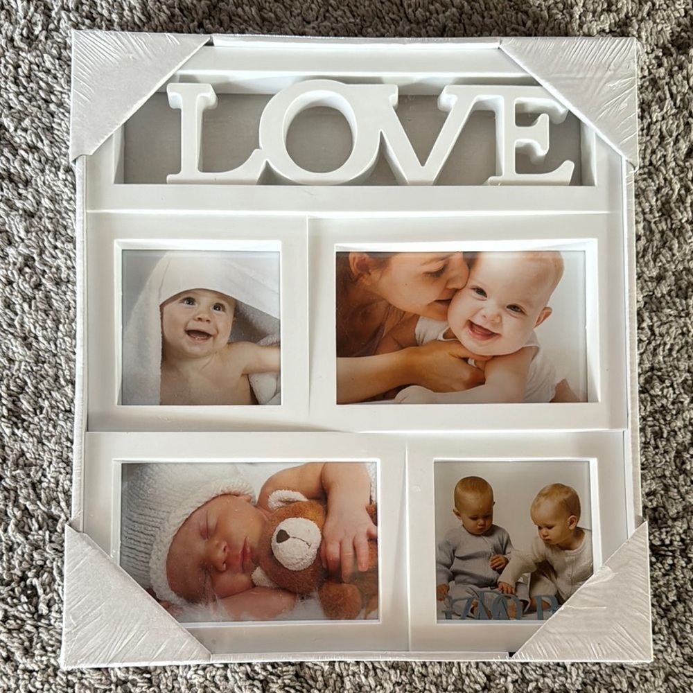 NWT White Picture Frames holds 4 pictures with ‘LOVE’